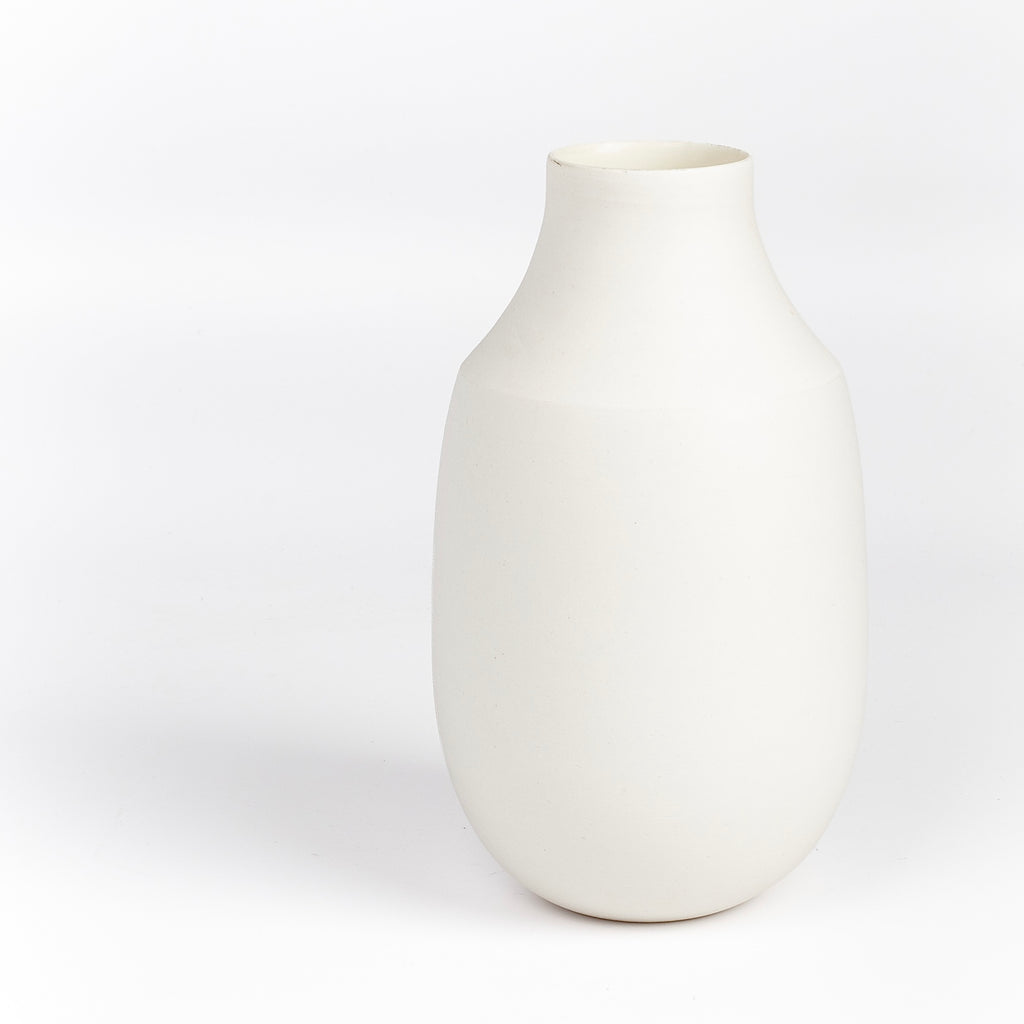 Lilith Rockett Vase with Neck "B" is Reminiscent of an eggshell, this vase is wheel thrown porcelain with gloss glaze on the interior and an unglazed exterior. It has been sanded smooth and it is very stable despite its rounded bottom. 