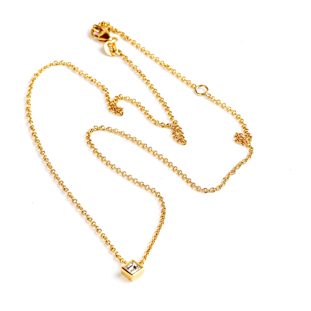 Carre Cut Diamond Bezel Solitaire Necklace by Lizzie Mandler on white background.
