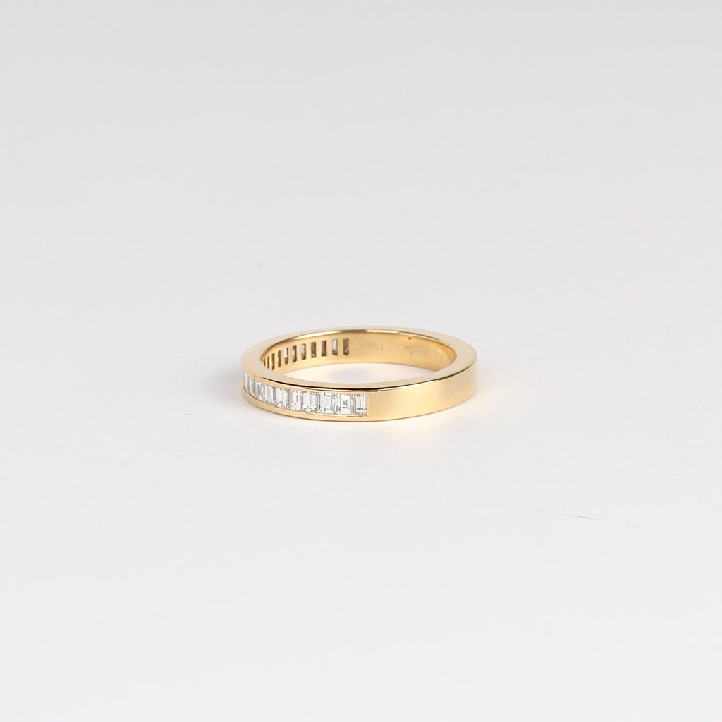 Side view of Vertical Petite Baguette Diamond Half Eternity Band by Lizzie Mandler.