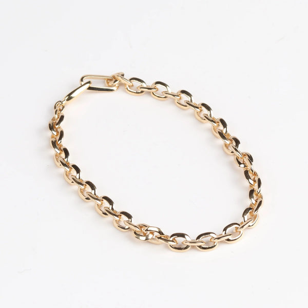 XS Knife Edge Link Bracelet by Lizzie Mandler is an extra small knife edge oval links chain bracelet is made out of same size clips in yellow gold with a clip closure. Handmade in Los Angeles.