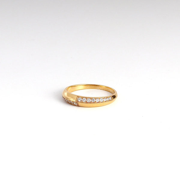 Petite Crescent Ring with Switch Pavé designed by Lizzie Mandler on white.