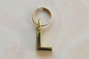 'L' Letter keyring, key chain, key ring in brass made by Carl Aubock. 