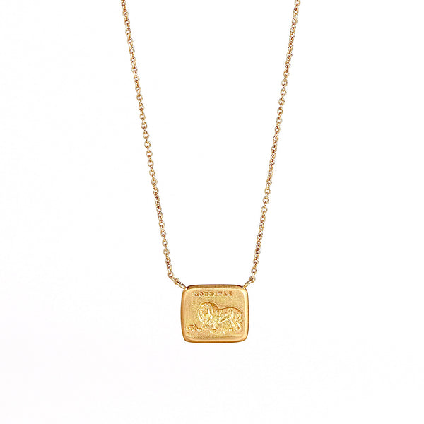 Lion and the Mouse Duo Motto Necklace by Makita Wakita in 18k yellow gold on white background. 