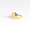 Octagonal Reflection Signet designed by Makiko Wakita n 18k yellow gold on white background.