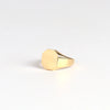 Octagonal Reflection Signet designed by Makiko Wakita is an 18k yellow gold and high polish signet ring with crisp edges and a octagonal face. This signet ring is unisex. A Handmade in Los Angeles.