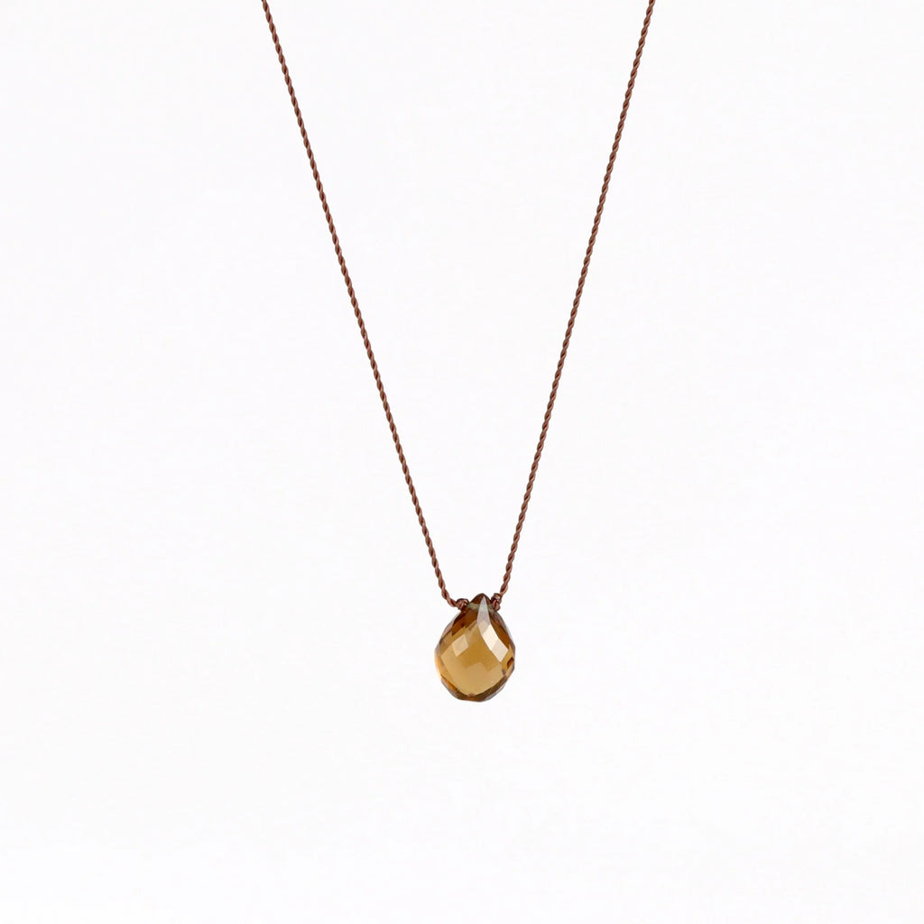 Cognac Quartz Zen Gem designed by Margaret Solow is an Individual translucent and faceted brown Cognac quartz gem on string makes this one of a kind organic pendant necklace. Designed by Margaret Solow. Handcrafted in Los Angeles.