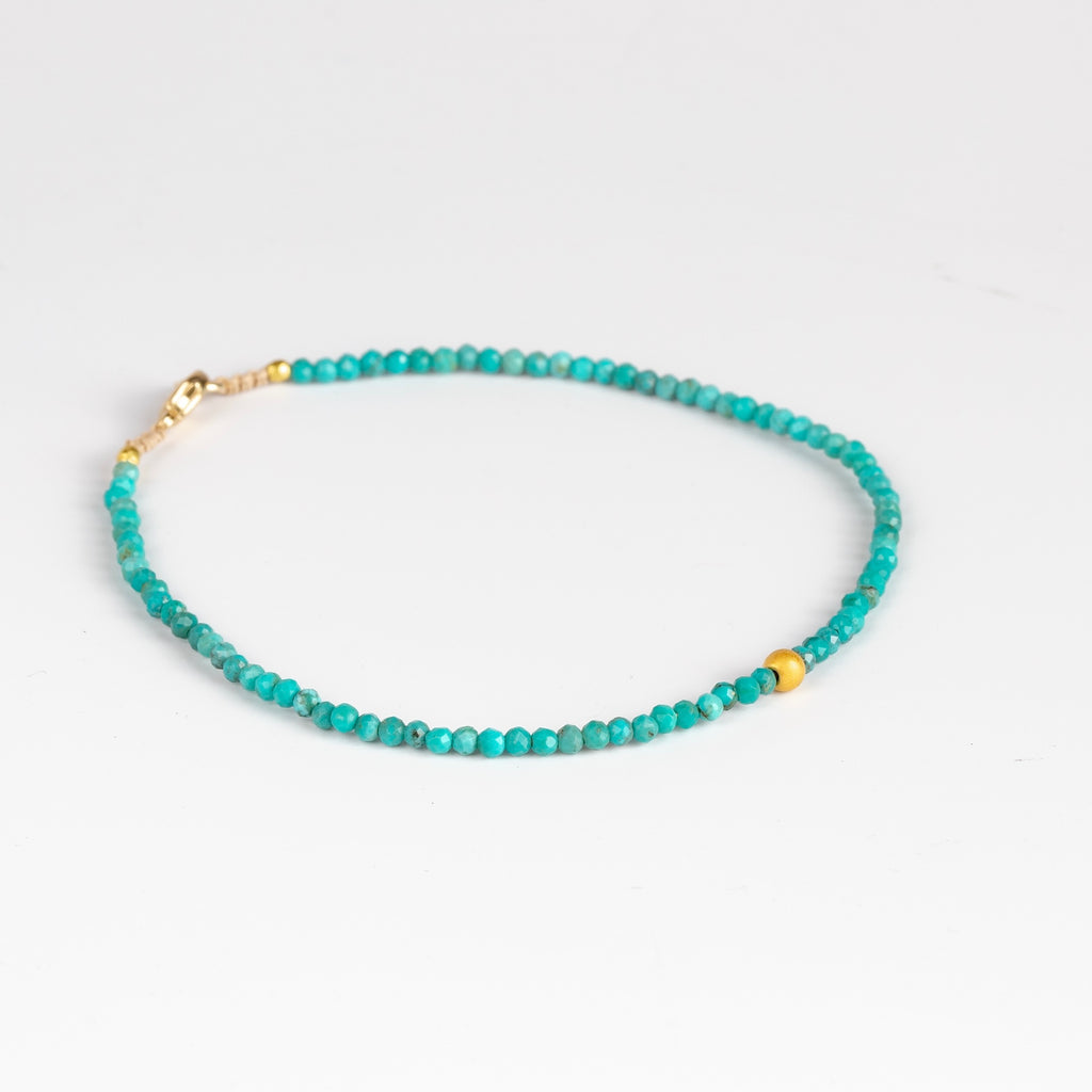 Turquoise and 18k bead bracelet by Margaret Solow.