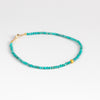 Turquoise and 18k bead bracelet by Margaret Solow.