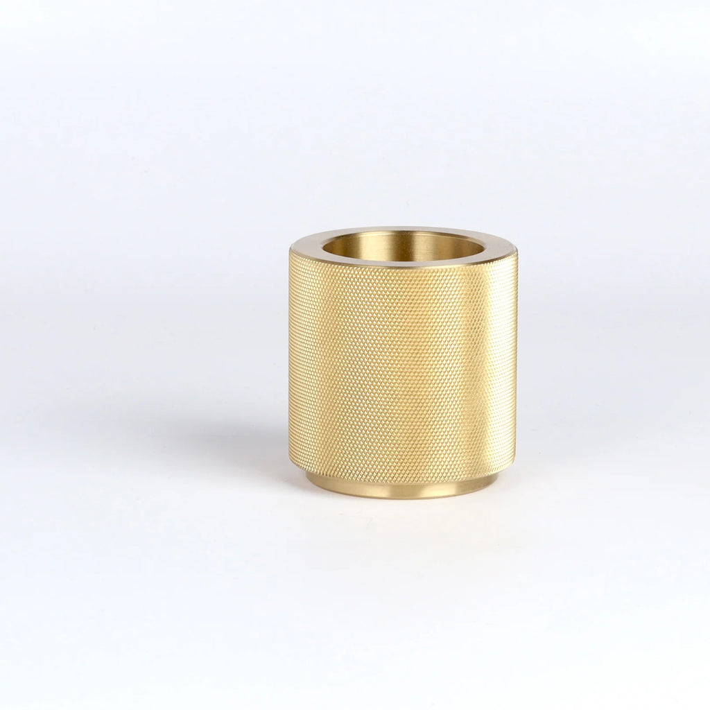 Brass match striker, forever object, on white background.
