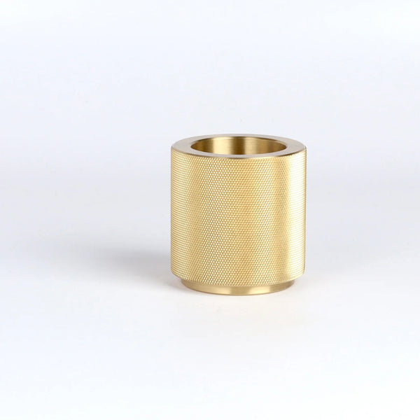 Brass match striker, forever object, on white background.