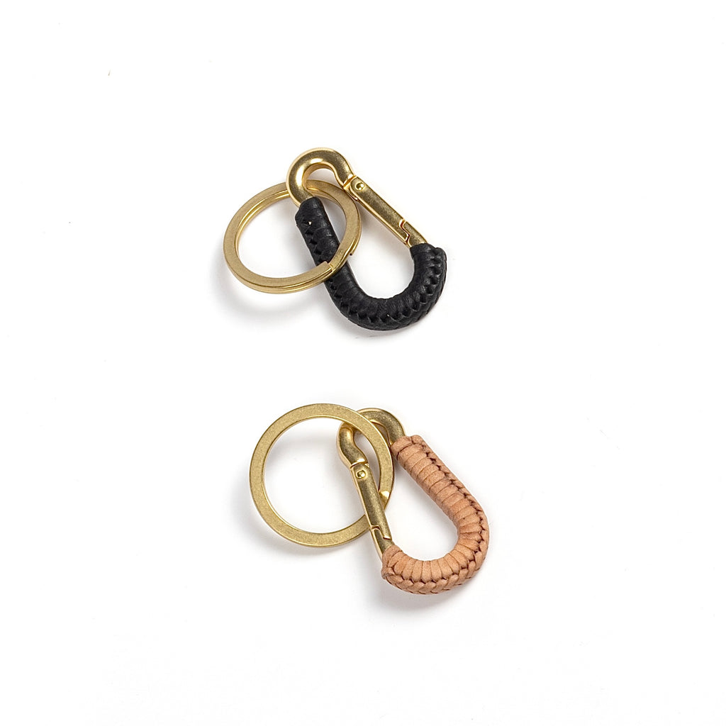 Black and natural leather carabiner clip or key fob in brass, braided in leather by Matthew Ready. Handmade in Los Angeles.