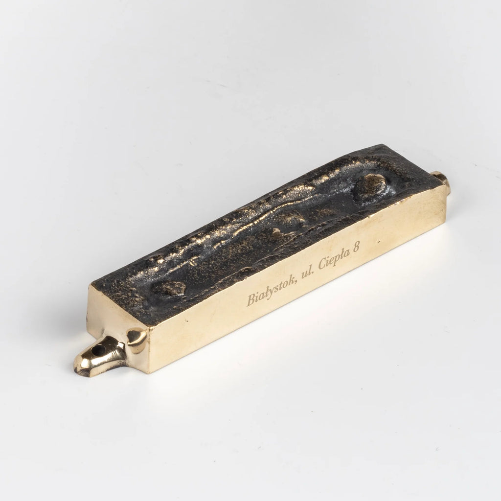Cast Bronze "Mezuzah From This Home" Mi Polin Bialystok, ulica Ciepla 8, Poland n white background.