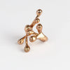 Monica Castiglioni Pistilli 29A Ring in bronze on white background.