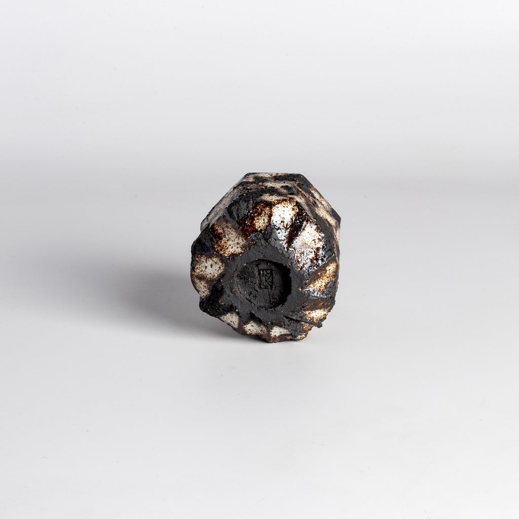 Stamp on Grogged and speckled Kurinuki Yunomi Teacup from Muzuri ware by Kyriacos Mouzouris in London UK.