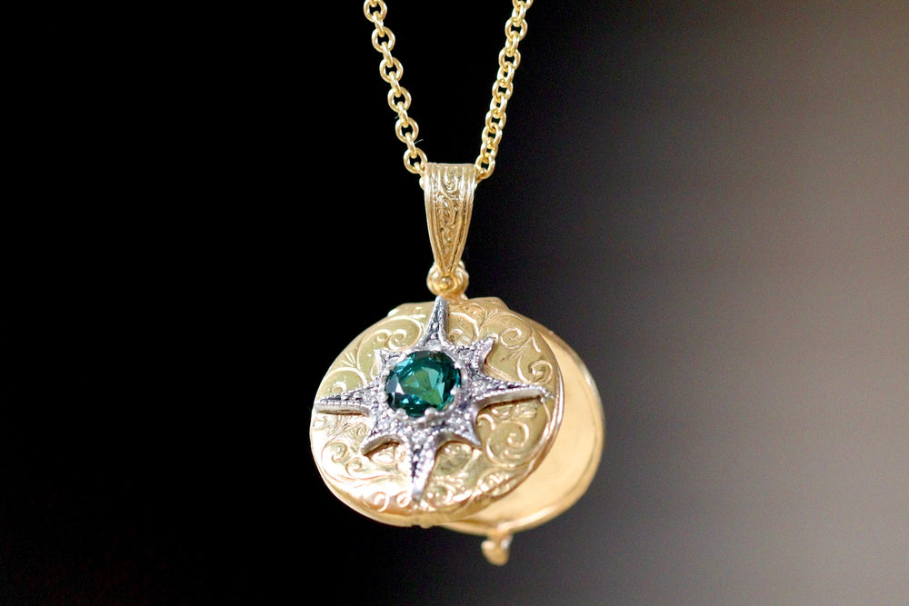 North star locket shown open.