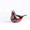 OIva Toikka Ruby Red Bird Dove in glass with red speckled design from Iittala on white background.