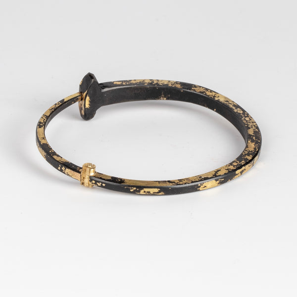 Gold Dust Pat Flynn Nail bracelet in 22k gold and iron from the back.