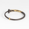 Back of Three Stone Half and Half Nail Bracelet by Pat Flynn on white background.