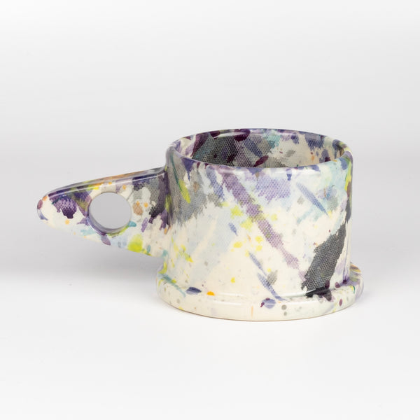 Other side of EXP Standard Splatter Mug in Purple, Lime Green and Orange.
