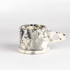 EXP standard splatter mugs by Peter Shire and Echo Park Pottry in black, white and gray.