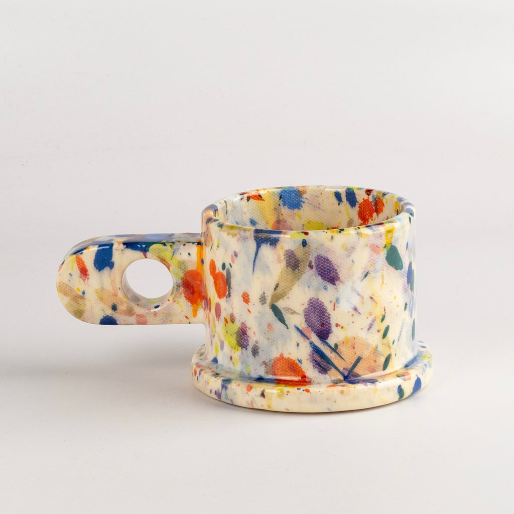 Other side of EXP Standard Splatter Mug in Blue, Orange and Purple Spots by Echo Park Pottery and Peter Shire.