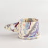 Other side of EXP Standard Splatter Mug in Plum with Purple Stripes by Peter Shire and Echo Park Pottery.