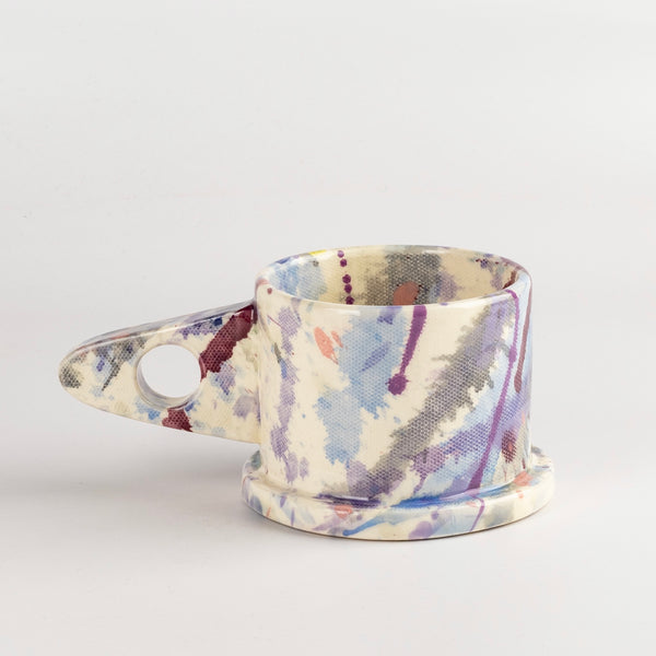 Other side of EXP Standard Splatter Mug in Plum with Purple Stripes by Peter Shire and Echo Park Pottery.