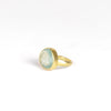 Side view of Large Greek ring in aquamarine by Pippa Small on white background.