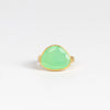 The Chrysoprase Greek Ring by Pippa Small Jewellery is an organically shaped, and hand cut, bright green, faceted and translucent chrysoprase set in 18k yellow gold. Size 6.5 in stock.
