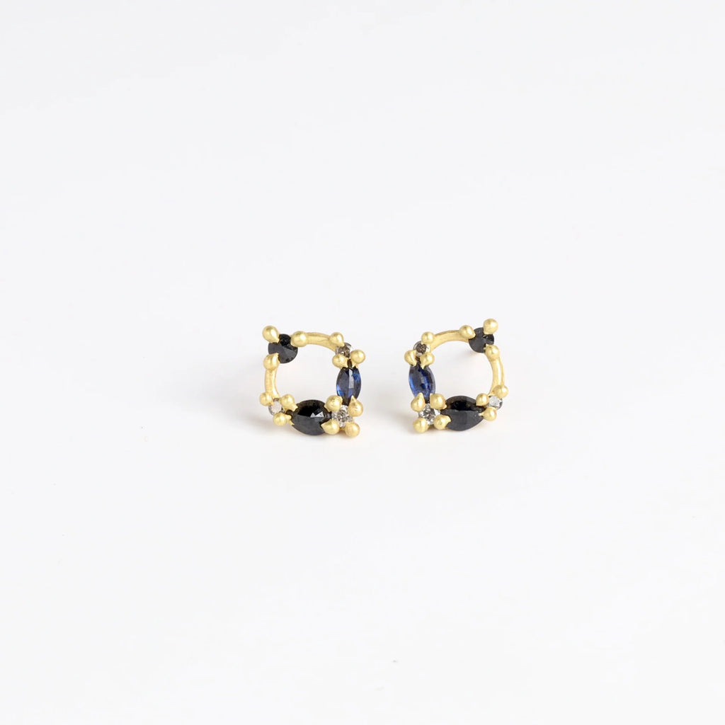 Polly Wales Des Goutes de Rosee Stud Earrings studs in Midnight Fade 18k Yellow Recycled Gold Blue and black sapphires and white diamonds. 
