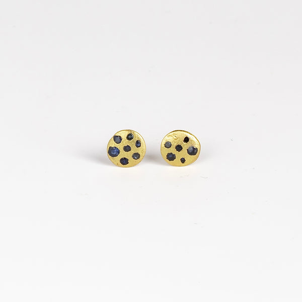 Polly Wales XS XSmall extra small Confetti Celeste Disc Stud Earrings in mid blue to navy Sapphires are classic, 18k recycled yellow gold disc earrings with blue in various shades sapphires, cast not set, cast in place and made in Los Angeles.