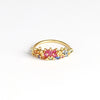Rainbow Daisy Garland Ring by Polly Wales is a ring of Encrusted rainbow sapphires on a petal crown ring in 18k recycled yellow gold. Cast in Place. Cast not set. Handcrafted in Los Angeles. 