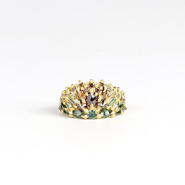 Mossy Bog Uber Encrusted Neli Half Shield ring is a mixed cut sapphires in green and white, cognac and champagne diamonds in an OK exclusive and one of a kind color way called "Mossy Bog" layered and encrusted into an 18k gold band. Cast Not Set. Handmade in Los Angeles. 