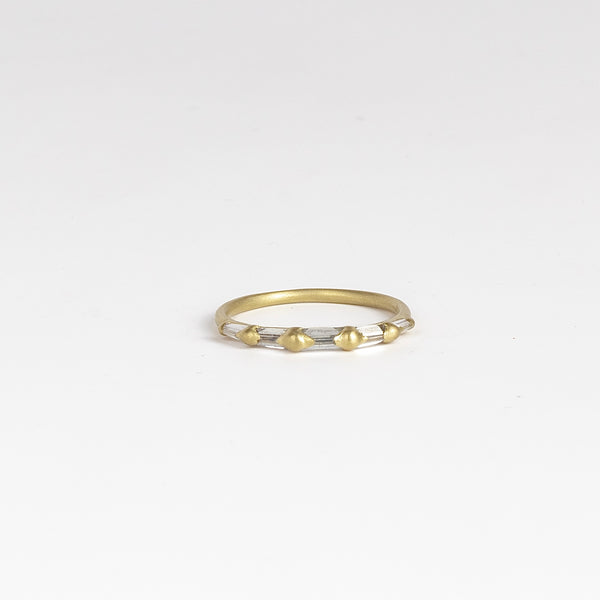 Lexi Diamond band ring by Polly Wales is a  halo band with five tapered baguette diamonds&nbsp;(.33tcw). Cast in Place. Cast not set.