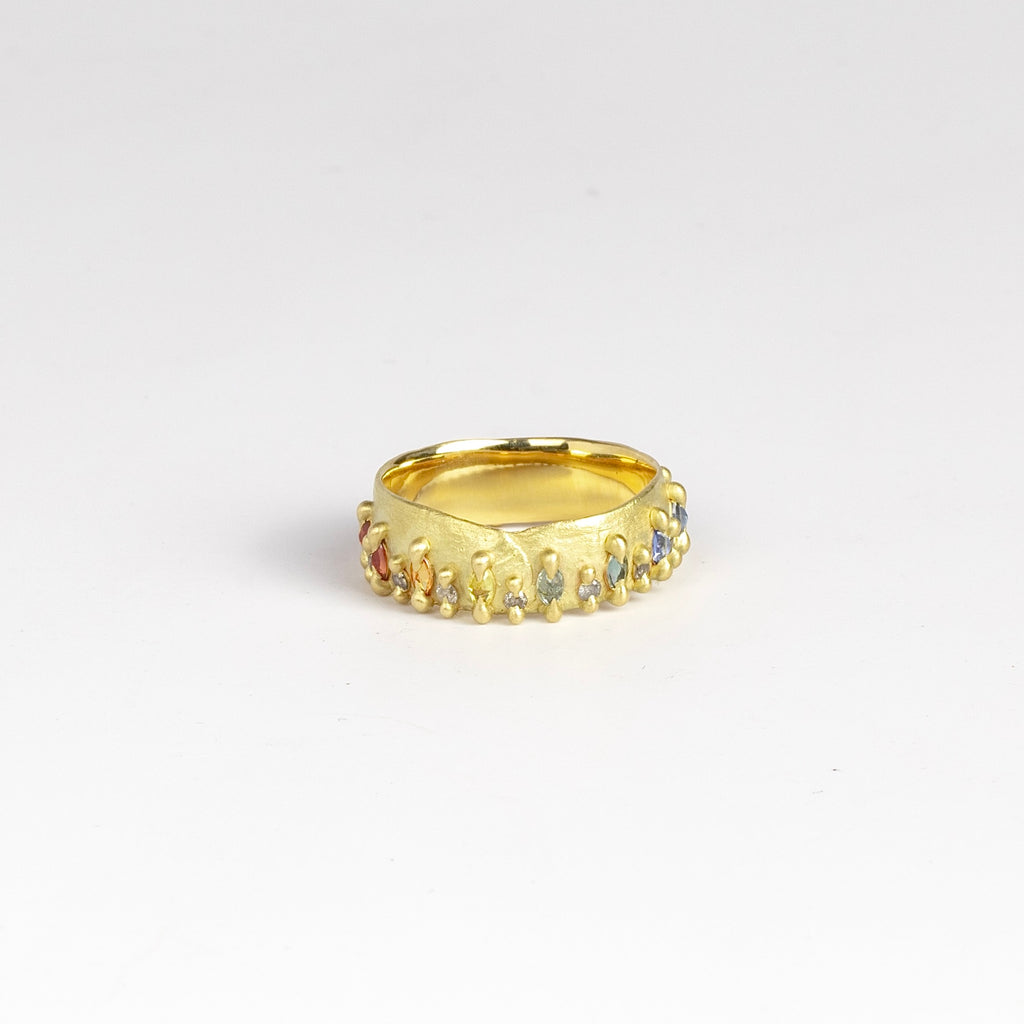 Noelle ring by Polly Wales in rainbow sapphires