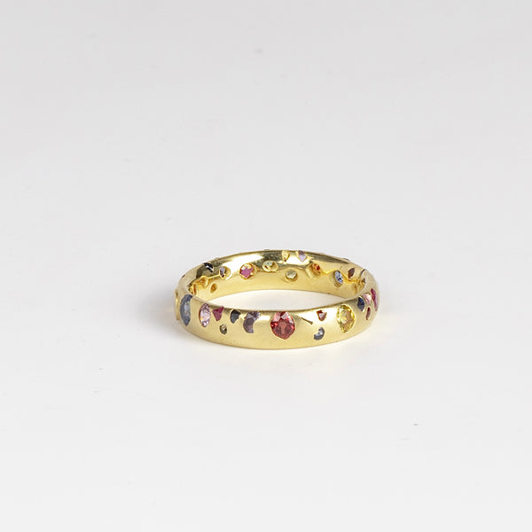 A one of a kind Rainbow Confetti Ring Band by Polly Wales in size 6.