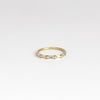 Lexi Diamond band ring by Polly Wales is a  halo band with five tapered baguette diamonds&nbsp;(.33tcw). Cast in Place. Cast not set.