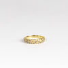 River Ring - Cognac Diamond by Polly Wales is a narrow scale pinched band in 18k recycled yellow gold encrusted with champagne to cognac diamonds. Cast in Place. Cast not set. Handcrafted in Los Angeles.
