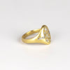 Side view of the unisex Harlequin Diamond Confetti Signet by Polly Wales in  matte 18k gold and mixed cut white diamonds size 6.5.