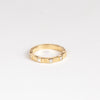 Pleated Five Stone Band Diamond Carre by Retrouvai is a wedding band ring made out of five carre cut diamonds in a pleated 14k yellow gold band. Size 6.5 in stock