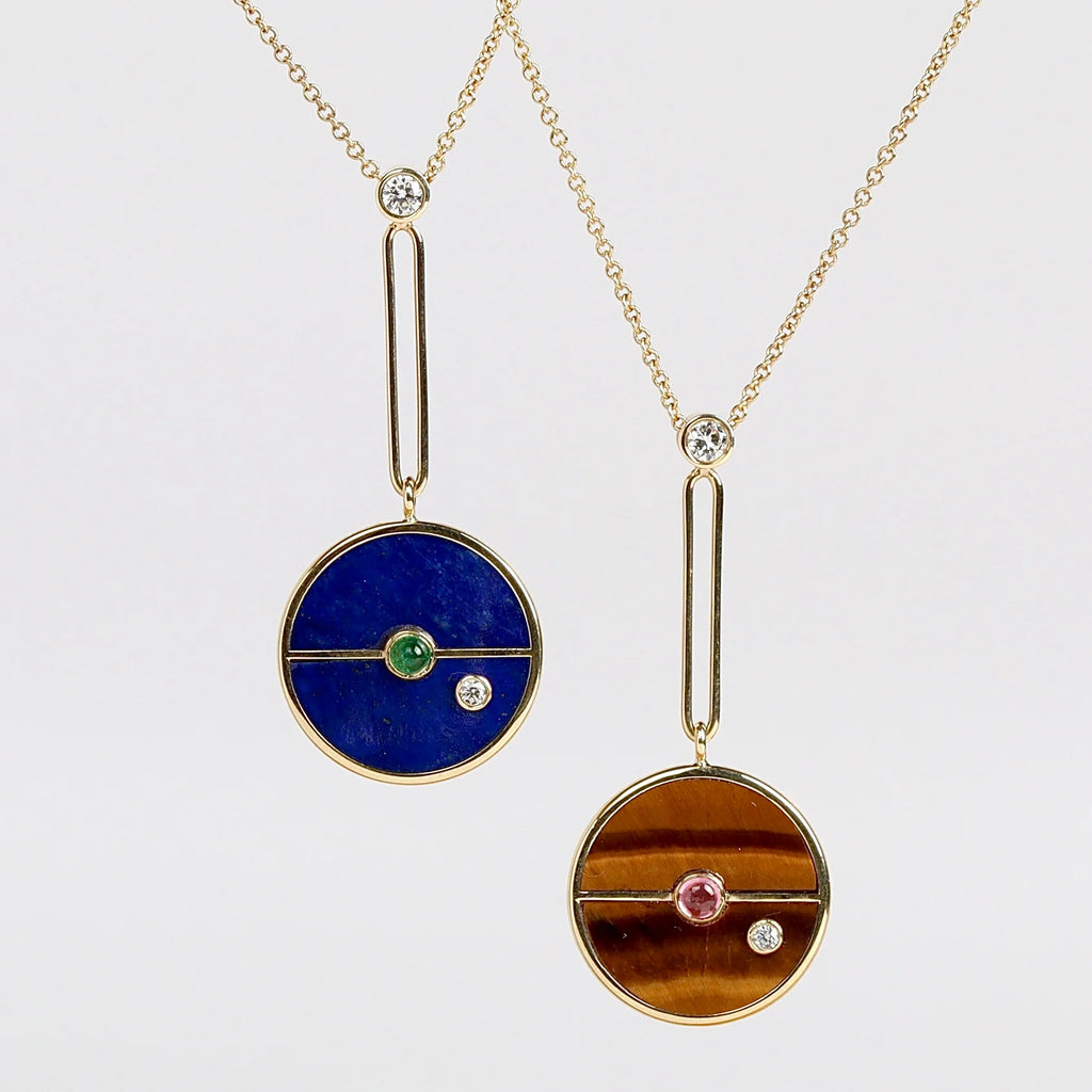 Compass Pendants by Retrouvai in Tigners Eye and Lapis with stone inlay and diamond accents.