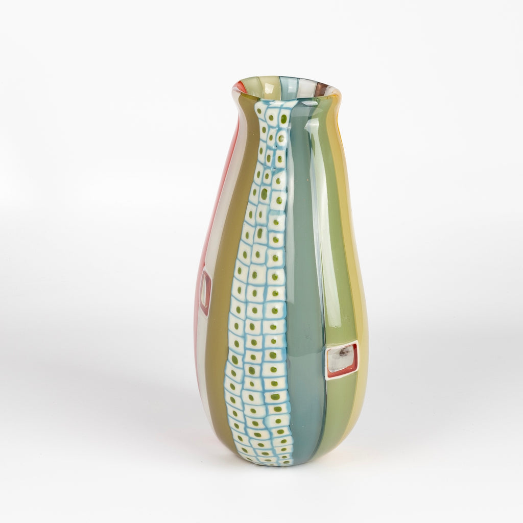 Side view of flat cane vase with murrini and windows.
