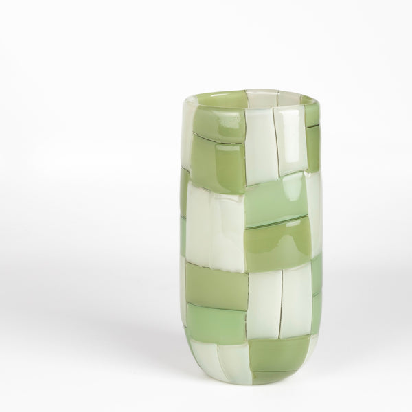 An  oval cylinder basketweave vase in green and white by Robin Mix whose sensibilities come from his training in Scandinavia, but is produced using the most sophisticated and iconic of traditional modernist Italian techniques. Vase is signed. 