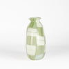 Side view of green basketweave vase by Robin Mix.