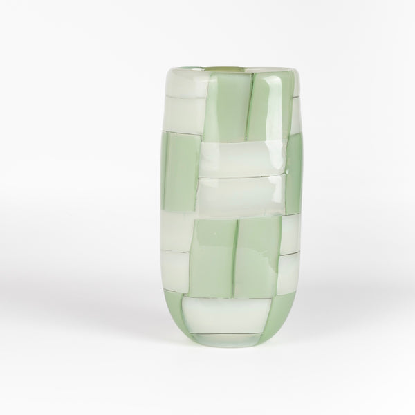 n  oval cylinder basketweave vase in green and white by Robin Mix whose sensibilities come from his training in Scandinavia, but is produced using the most sophisticated and iconic of traditional modernist Italian techniques. Vase is signed. 