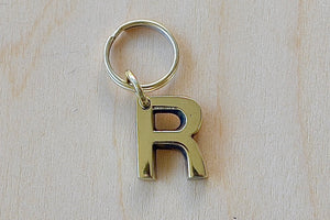 'R' Letter keyring, key chain, key ring in brass made by Carl Aubock. 