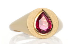 Studio shot of Circle Signet with Pear Tourmaline.