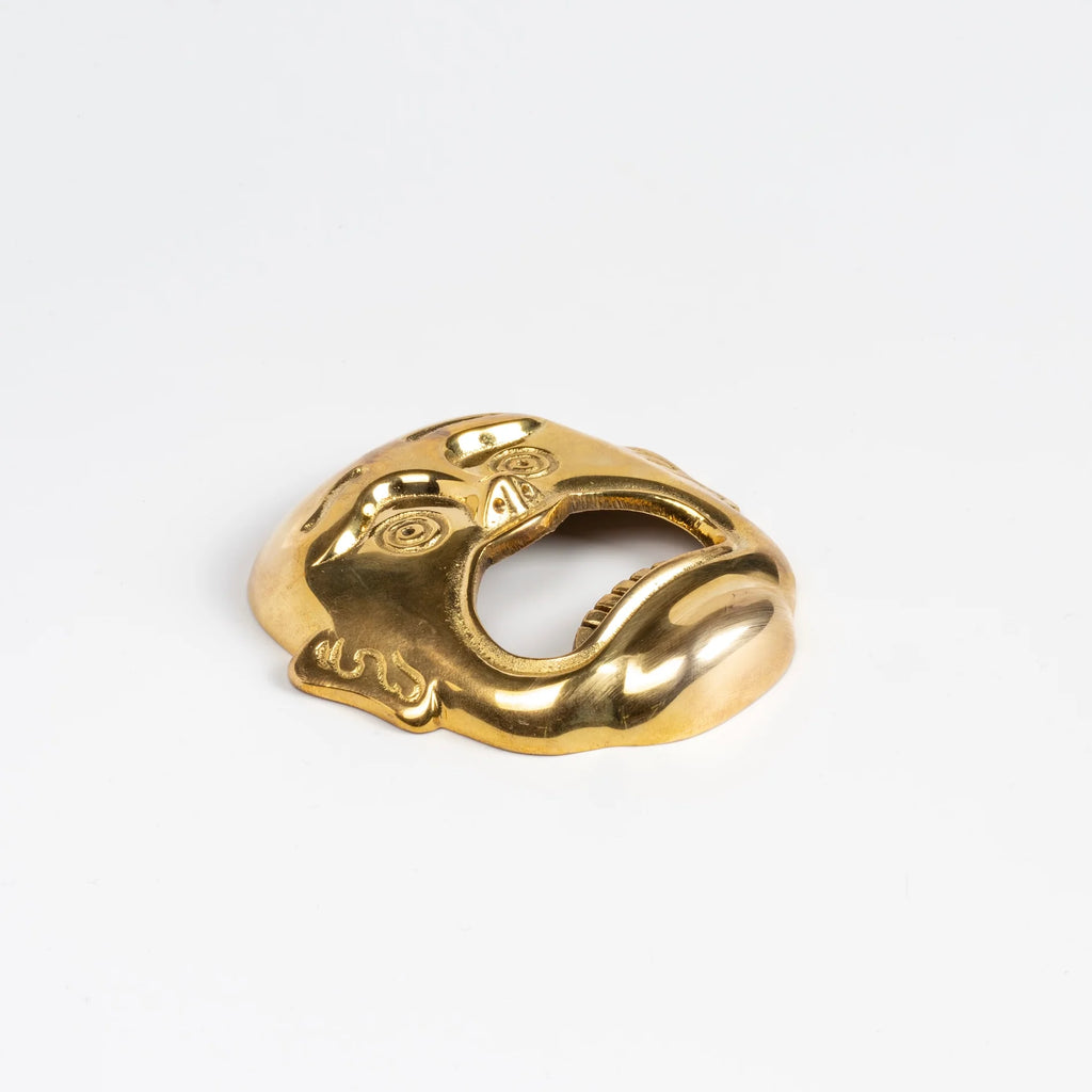 Side view of Skultuna "Open Sesame" Bottle Opener in brass.