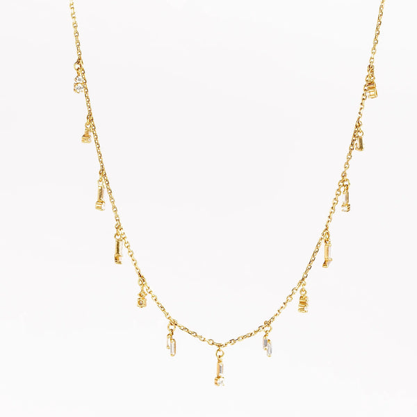 Mini Diamond  Dangle Necklace by Suzanne Kalan is an 18k gold chain necklace with mixed drop dangles in white diamond baguettes and round diamonds.