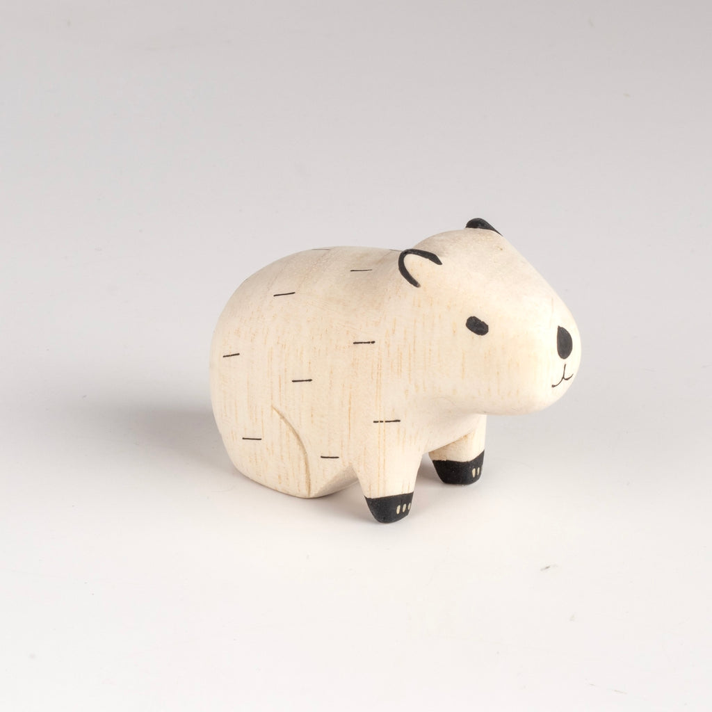 The cutest capybara toy or figurine from Japanese design company T-Lab, handmade in Bali from albizia wood, a lightweight fast-growing wood from the South Pacific. 